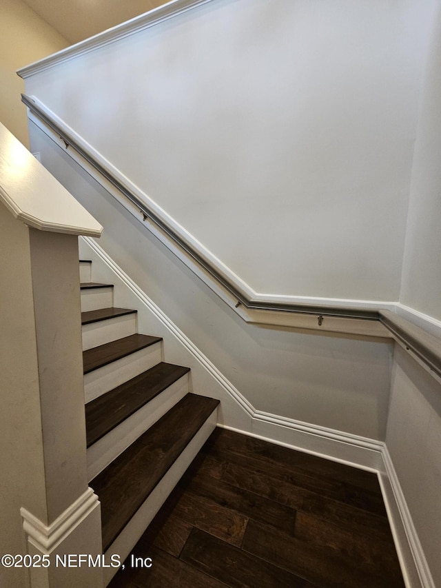 stairs with wood finished floors