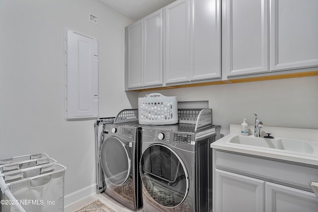 290 Marquesa Cir, Saint Johns, FL 32259 - clothes washing area with a sink, baseboards, independent washer and dryer, and cabinet space