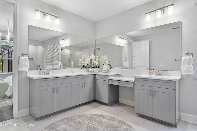 290 Marquesa Cir, Saint Johns, FL 32259 - bathroom featuring a walk in shower, vanity, tile patterned flooring, and baseboards