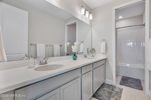 290 Marquesa Cir, Saint Johns, FL 32259 - full bathroom featuring baseboards, double vanity, tile patterned floors, and a sink