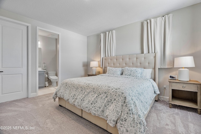 290 Marquesa Cir, Saint Johns, FL 32259 - carpeted bedroom with baseboards, a textured ceiling, and connected bathroom