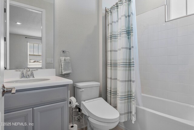 290 Marquesa Cir, Saint Johns, FL 32259 - bathroom featuring vanity, a textured wall, shower / bath combo, and toilet
