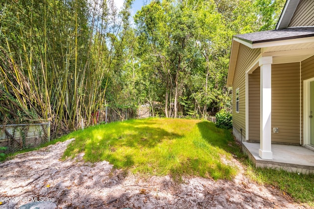 view of yard with fence