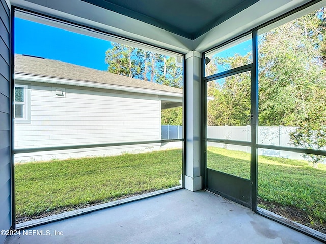 unfurnished sunroom with a healthy amount of sunlight