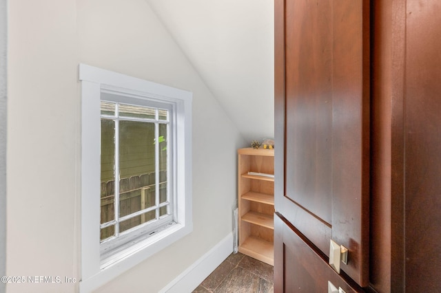 interior space with vaulted ceiling