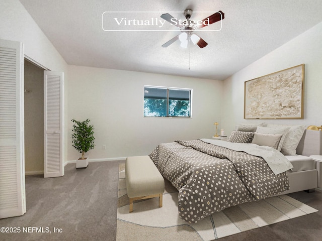 3801 Crown Point Rd Unit 1311, Jacksonville, FL 32257 - bedroom featuring baseboards, ceiling fan, and carpet floors
