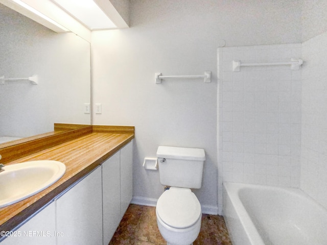 3801 Crown Point Rd Unit 1311, Jacksonville, FL 32257 - full bathroom featuring baseboards, toilet, and vanity