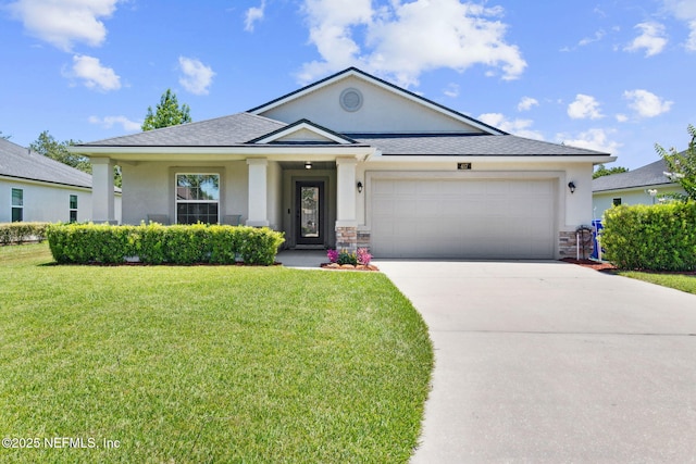 417 Palazzo Cir, Saint Augustine, FL 32092 - view of front of home featuring stucco siding, a front lawn, concrete driveway, an attached garage, and a shingled roof
