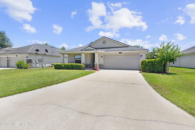 417 Palazzo Cir, Saint Augustine, FL 32092 - view of front of house featuring driveway, stucco siding, a front yard, and a garage