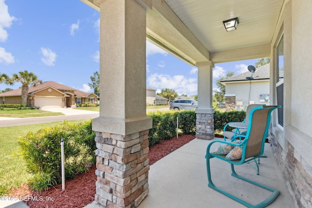 417 Palazzo Cir, Saint Augustine, FL 32092 - porch featuring a residential view