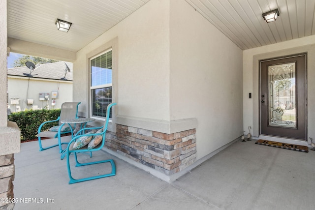 417 Palazzo Cir, Saint Augustine, FL 32092 - property entrance with stucco siding and covered porch