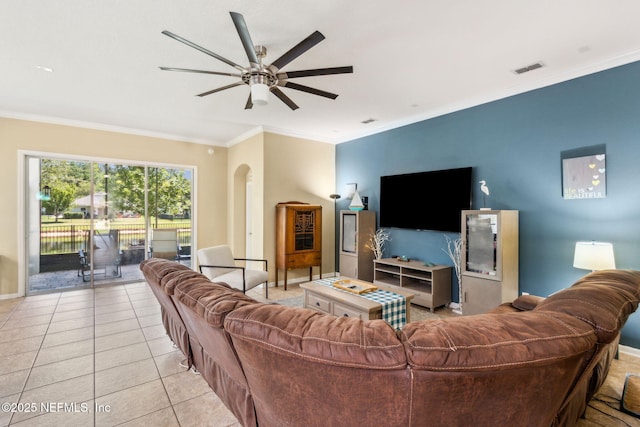 417 Palazzo Cir, Saint Augustine, FL 32092 - living area featuring arched walkways, ceiling fan, ornamental molding, and light tile patterned floors