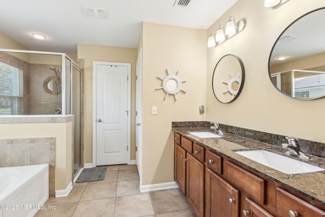 417 Palazzo Cir, Saint Augustine, FL 32092 - bathroom featuring a stall shower, double vanity, a bath, and tile patterned flooring