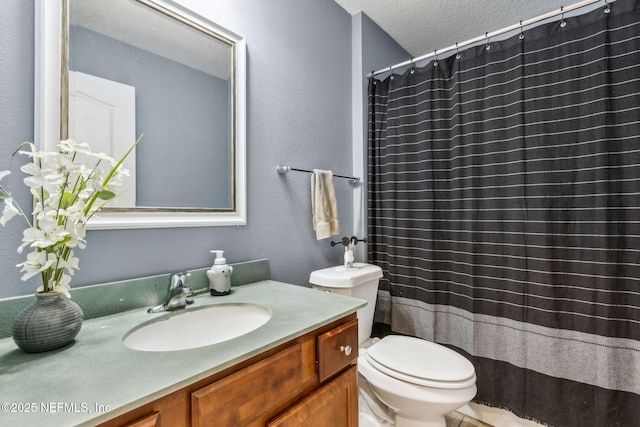 417 Palazzo Cir, Saint Augustine, FL 32092 - full bathroom with vanity, a textured ceiling, a shower with curtain, and a textured wall