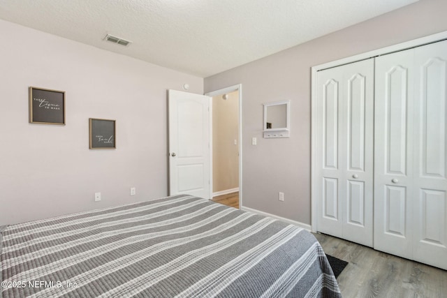 417 Palazzo Cir, Saint Augustine, FL 32092 - unfurnished bedroom featuring wood finished floors and a closet