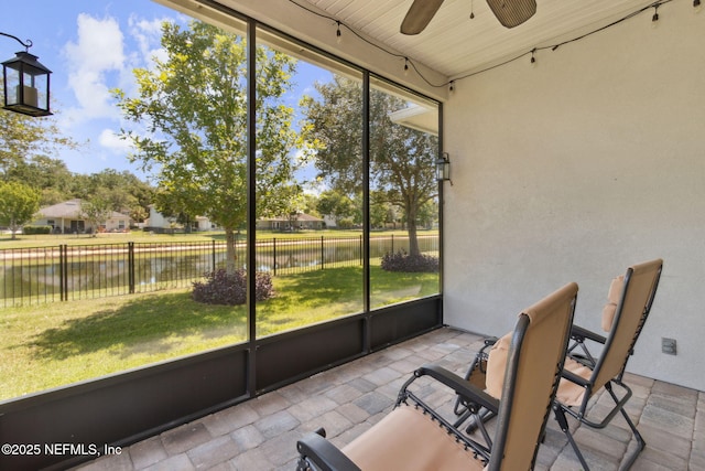 417 Palazzo Cir, Saint Augustine, FL 32092 - sunroom featuring a water view and ceiling fan