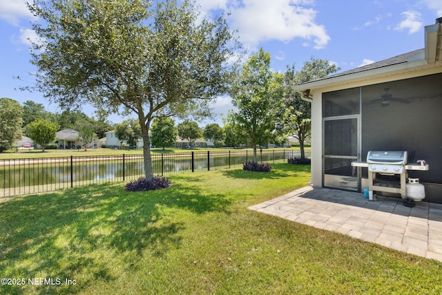 417 Palazzo Cir, Saint Augustine, FL 32092 - fenced backyard featuring a water view, a sunroom, and a patio area