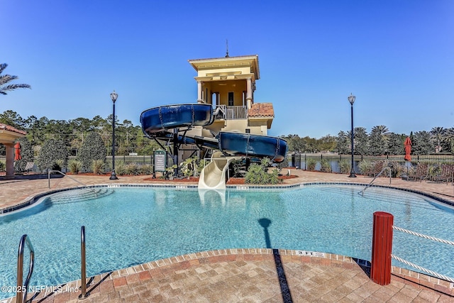 417 Palazzo Cir, Saint Augustine, FL 32092 - community pool with a water slide and a patio area