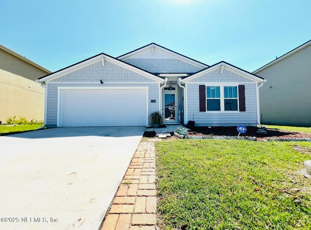 single story home with a front yard, driveway, and a garage