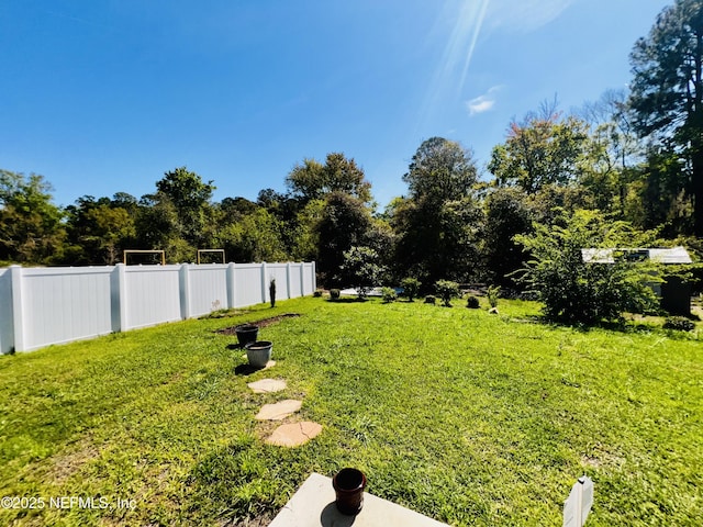 view of yard with fence