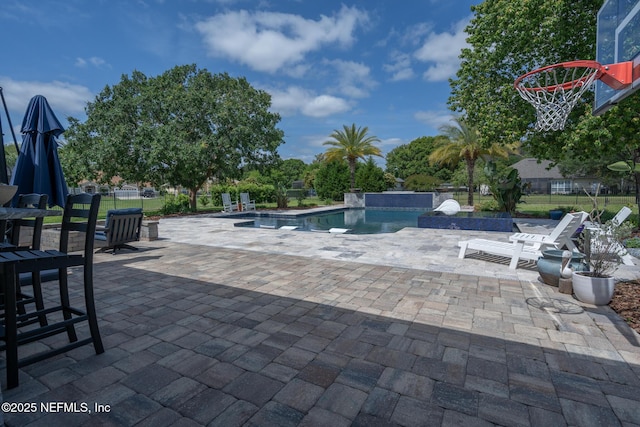view of pool with fence, a patio, and a fenced in pool