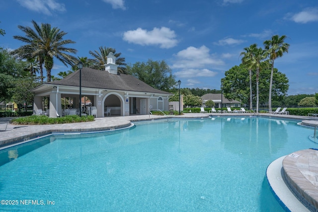 community pool with a patio