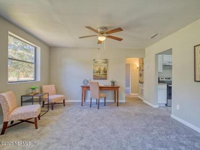 9717 Carbondale Dr W, Jacksonville, FL 32208 - carpeted home office featuring baseboards and a ceiling fan
