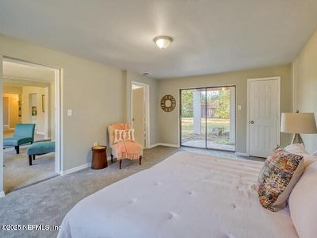 9717 Carbondale Dr W, Jacksonville, FL 32208 - bedroom with access to exterior, carpet flooring, and baseboards