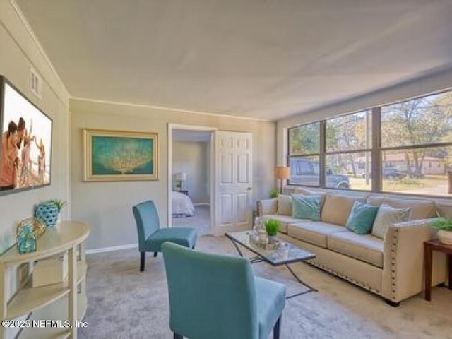 9717 Carbondale Dr W, Jacksonville, FL 32208 - living area featuring light colored carpet and baseboards