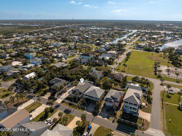 bird's eye view with a residential view and a water view