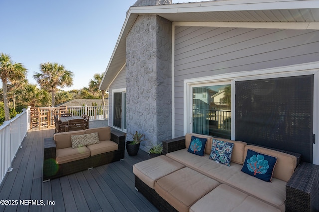 deck with an outdoor living space
