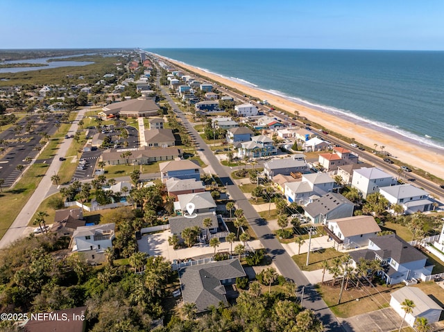 birds eye view of property with a residential view, a view of the beach, and a water view