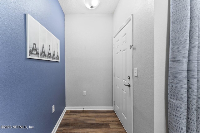 4958 Key Lime Dr Unit 106, Jacksonville, FL 32256 - hallway featuring wood finished floors and baseboards