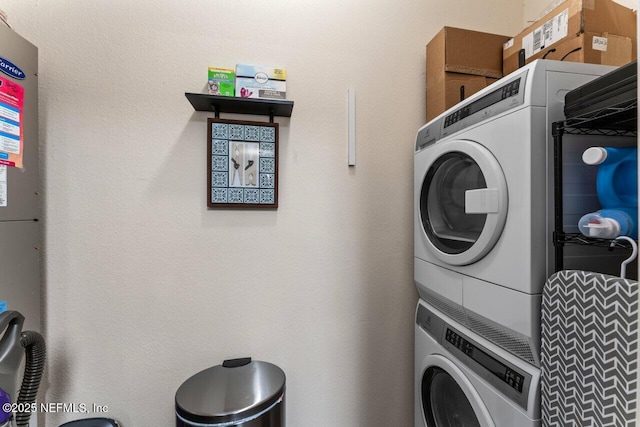 4958 Key Lime Dr Unit 106, Jacksonville, FL 32256 - laundry room with stacked washer / drying machine and laundry area