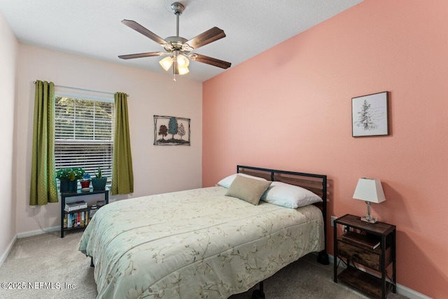 4958 Key Lime Dr Unit 106, Jacksonville, FL 32256 - carpeted bedroom with ceiling fan and baseboards