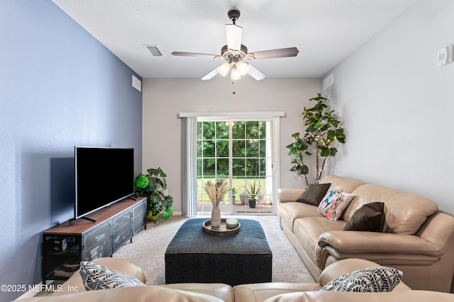 4958 Key Lime Dr Unit 106, Jacksonville, FL 32256 - carpeted living area with visible vents and ceiling fan