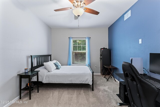 4958 Key Lime Dr Unit 106, Jacksonville, FL 32256 - carpeted bedroom featuring visible vents, ceiling fan, and baseboards