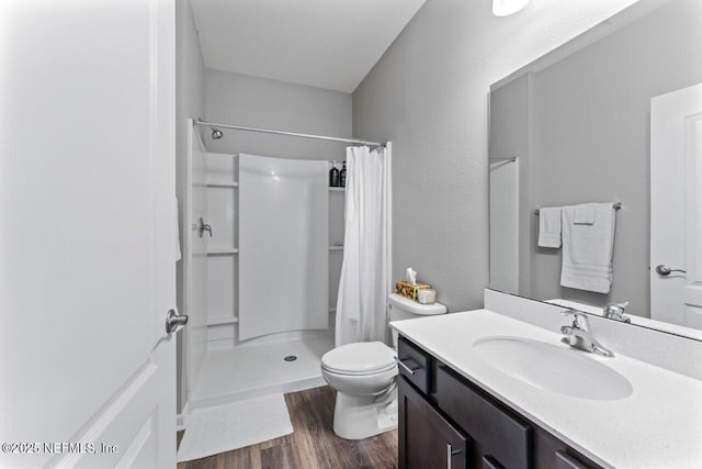 4958 Key Lime Dr Unit 106, Jacksonville, FL 32256 - full bath with toilet, vanity, wood finished floors, and a shower with shower curtain
