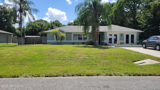 6070 Baltimore Ave, Cocoa, FL 32927 - single story home featuring french doors and stucco siding