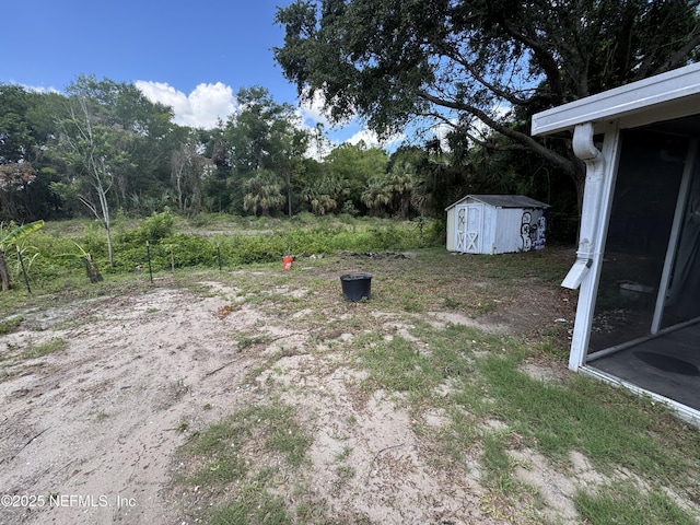 6070 Baltimore Ave, Cocoa, FL 32927 - view of yard with a shed and an outdoor structure