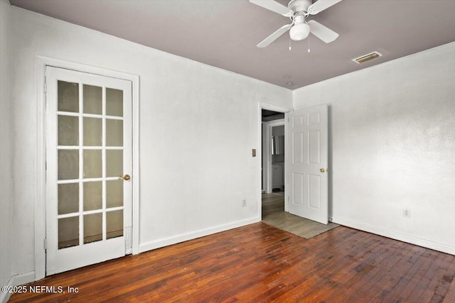 8384 Delaware Ave, Jacksonville, FL 32208 - empty room featuring wood finished floors, baseboards, and a ceiling fan