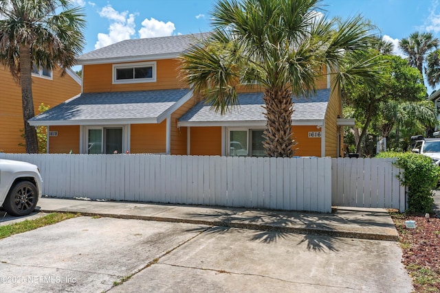 1616 1st St, Neptune Beach, FL 32266 - bungalow-style home featuring a shingled roof