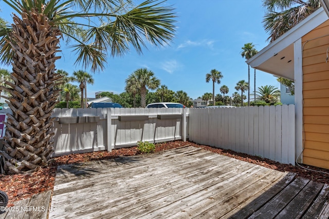 1616 1st St, Neptune Beach, FL 32266 - wooden deck with a fenced backyard