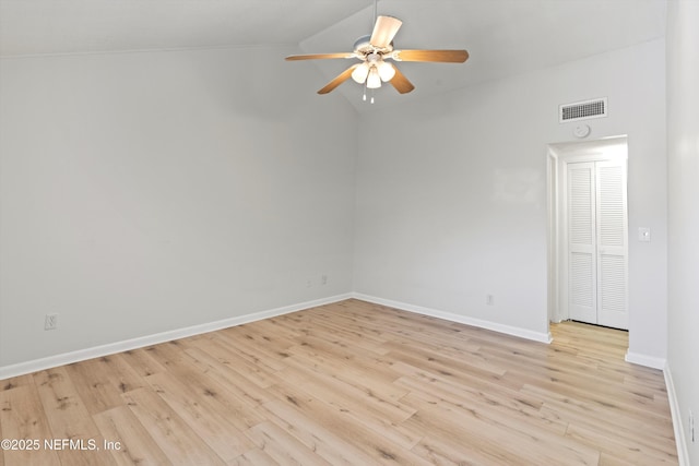 1616 1st St, Neptune Beach, FL 32266 - unfurnished room featuring ceiling fan, wood finished floors, baseboards, and high vaulted ceiling