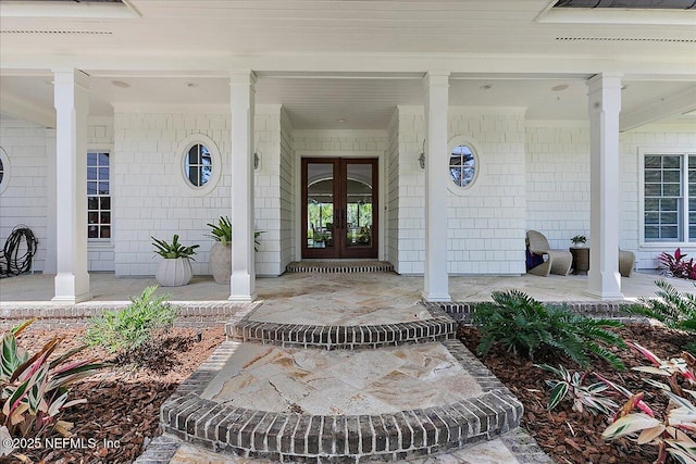 301 S Roscoe Blvd, Ponte Vedra Beach, FL 32082 - entrance to property with covered porch and french doors