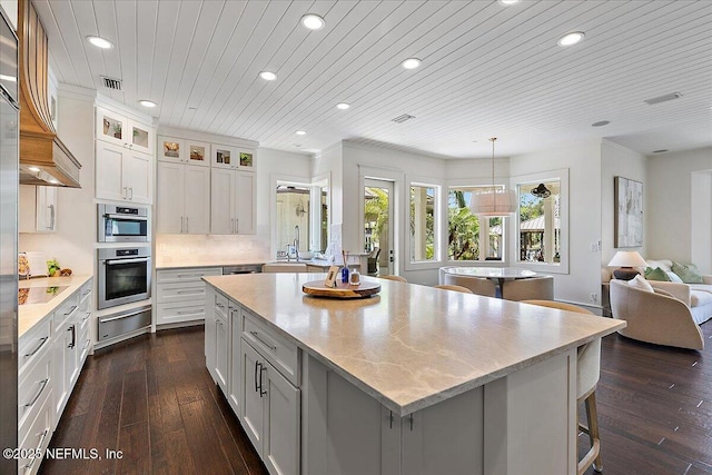 301 S Roscoe Blvd, Ponte Vedra Beach, FL 32082 - kitchen with dark wood-style flooring, visible vents, a sink, a warming drawer, and recessed lighting