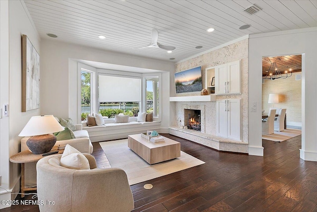 301 S Roscoe Blvd, Ponte Vedra Beach, FL 32082 - living area featuring a fireplace, a ceiling fan, wooden ceiling, visible vents, and dark wood-style floors