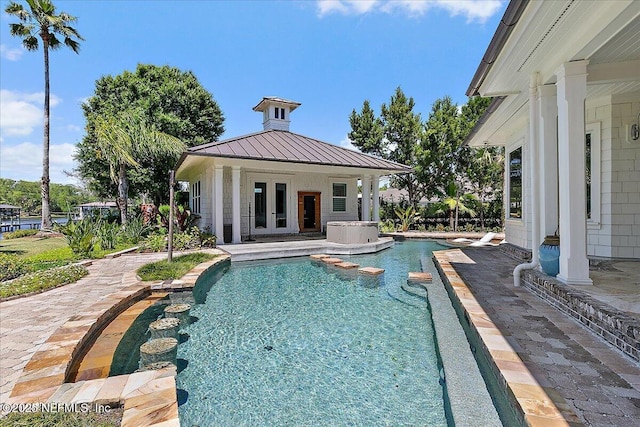 301 S Roscoe Blvd, Ponte Vedra Beach, FL 32082 - outdoor pool with french doors, a patio, and a jacuzzi