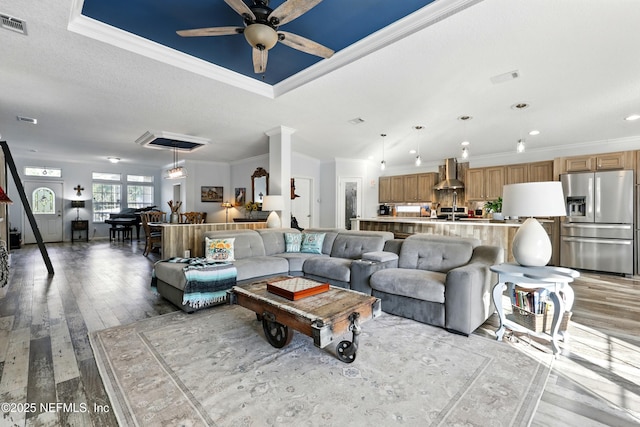 1417 Marlee Rd, Saint Johns, FL 32259 - living area with crown molding, light wood-type flooring, ceiling fan, and recessed lighting
