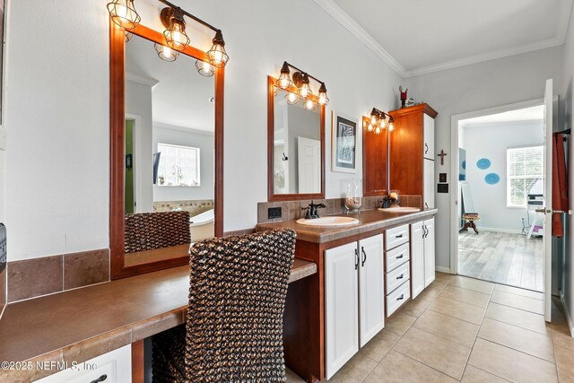 1417 Marlee Rd, Saint Johns, FL 32259 - full bathroom with ornamental molding, vanity, tile patterned floors, and backsplash